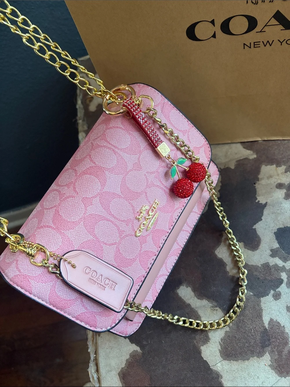 Coach Pink Signature Crossbody Bag with Gold Chain & Cherry Charm
